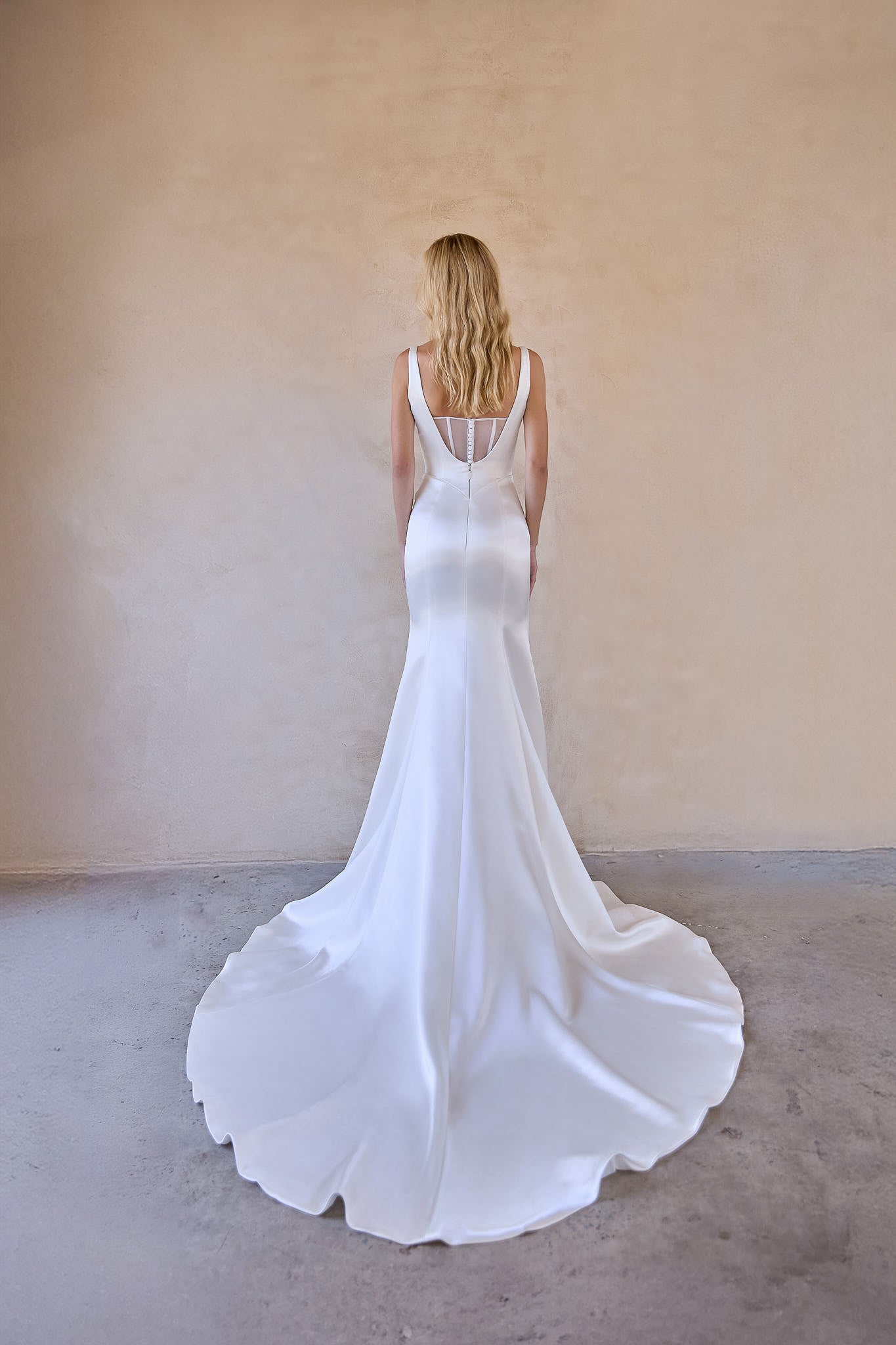 Invisible zip and button details on The Bryde's Jaya bridal dress."