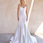 Mermaid silhouette of The Bryde's Jaya gown, accentuating curves elegantly.